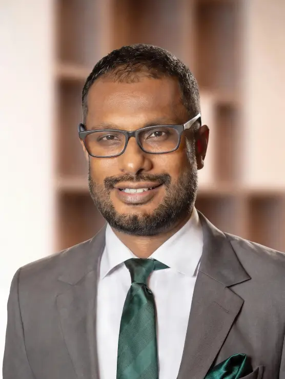 A portrait photograph of Nishal Ferdinando
